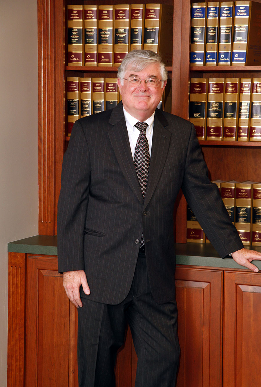 Headshot of attorney George E. MacDonald